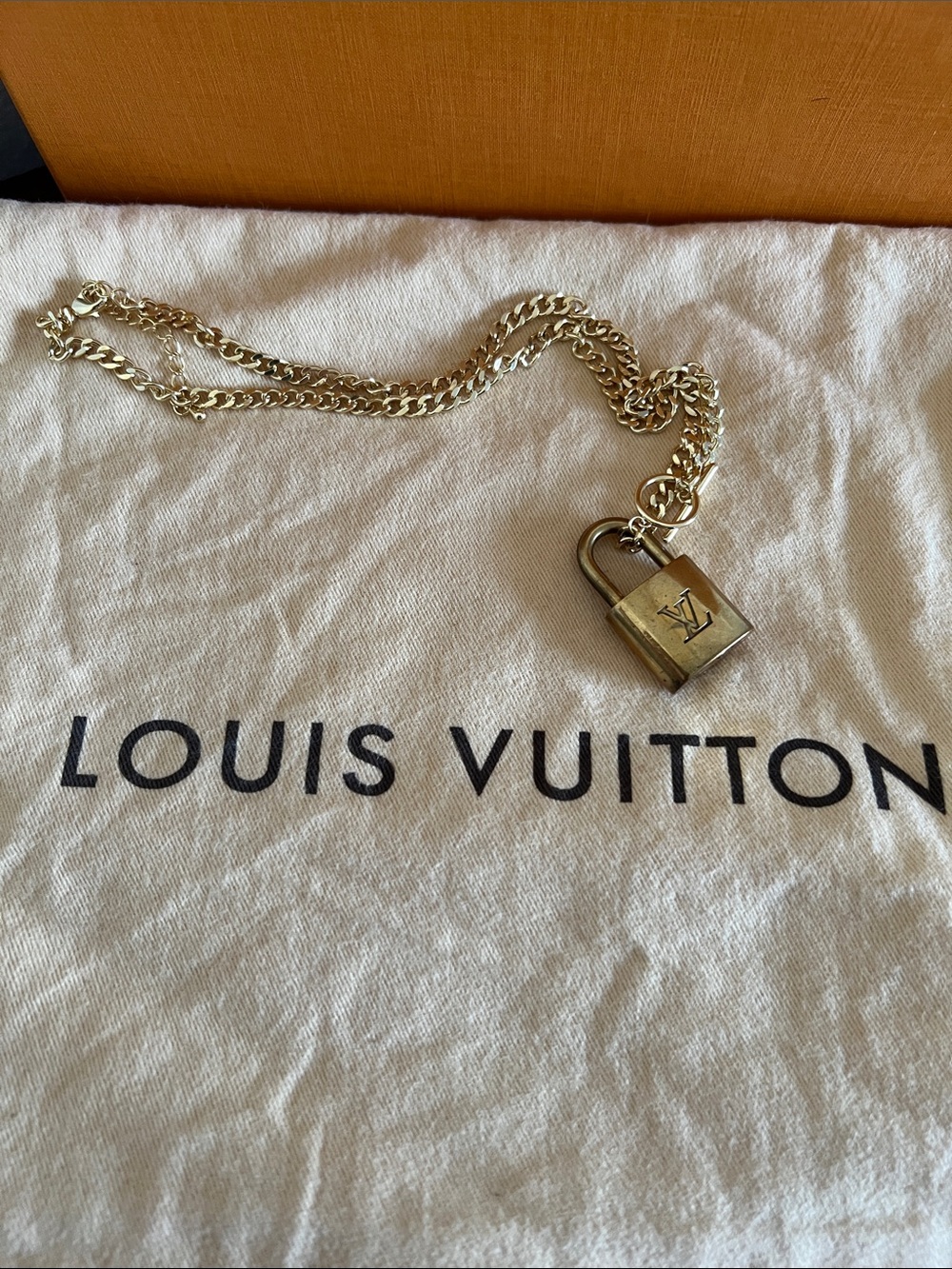 Louis Vuitton Gold-Tone Lock
